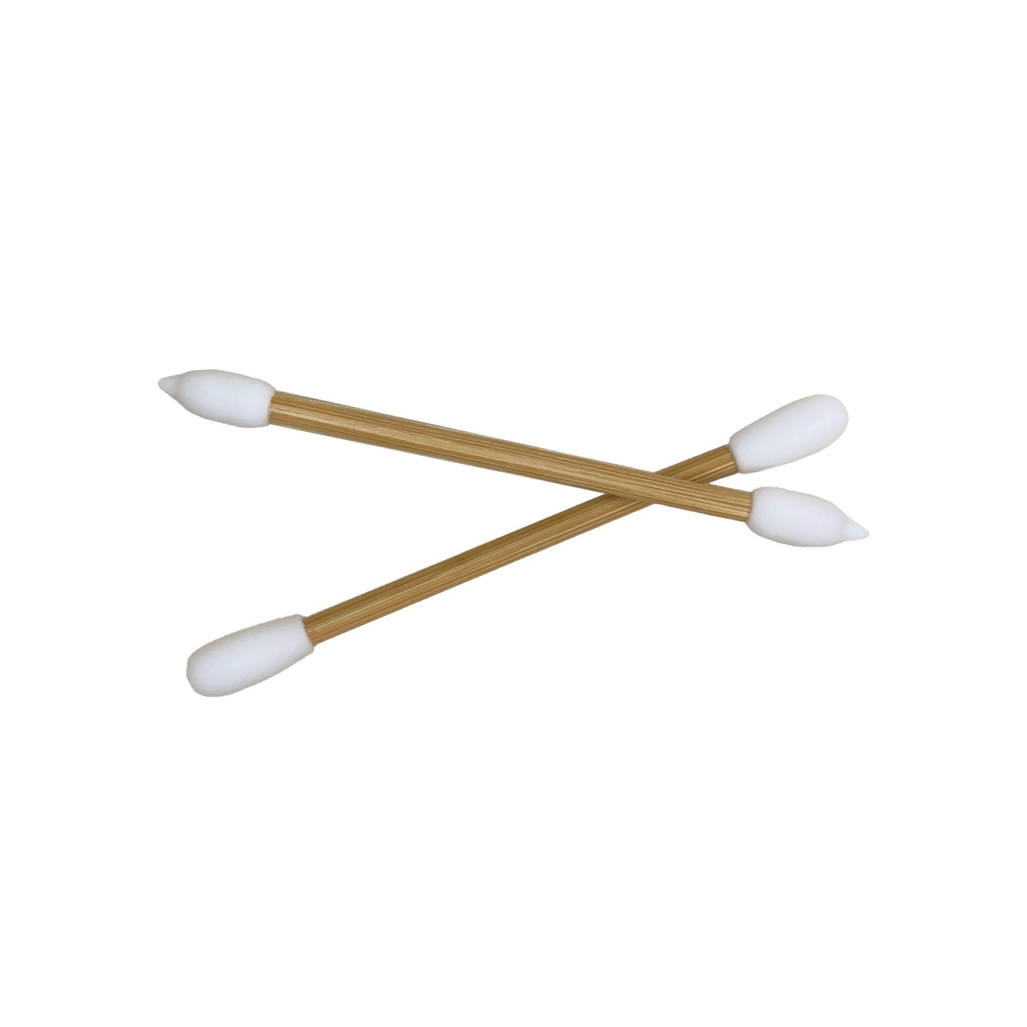 Two reusable makeup swabs with bamboo sticks and white silicone tips are crossed.