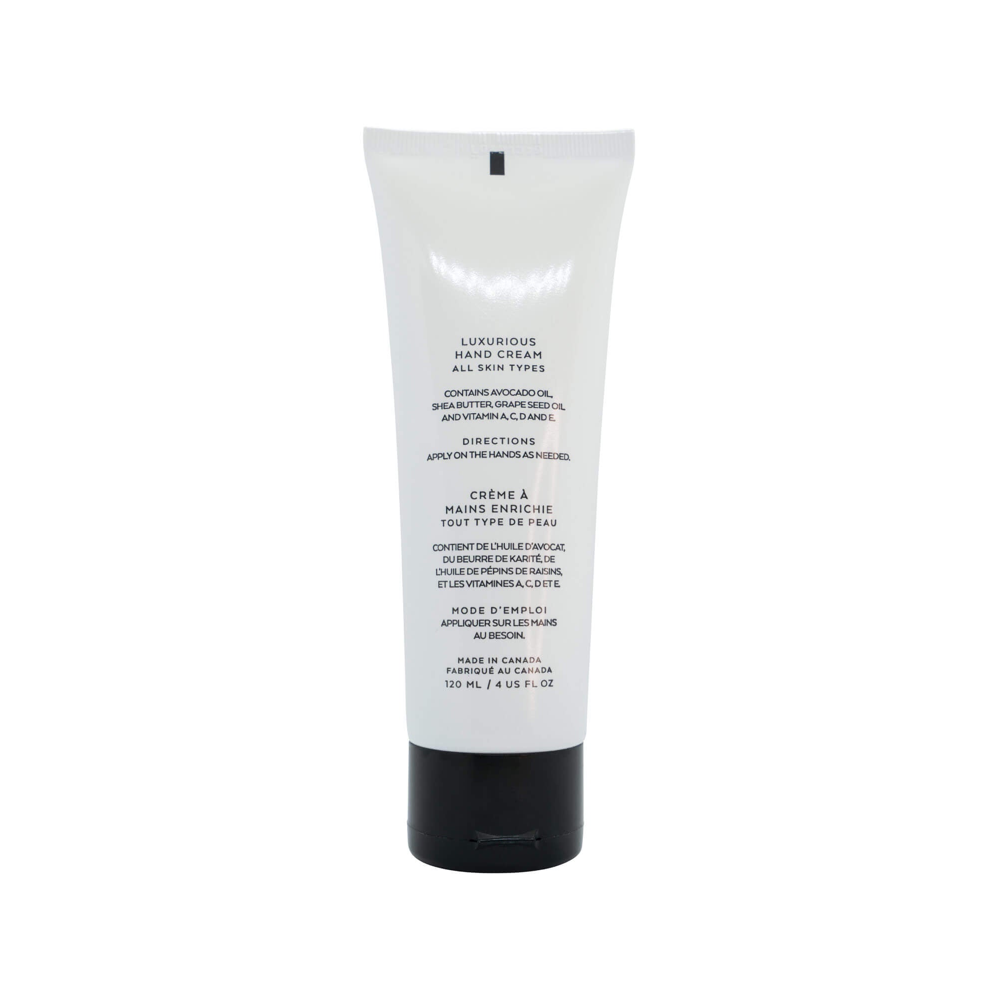 White hand cream tube with a black cap and text in English and French.