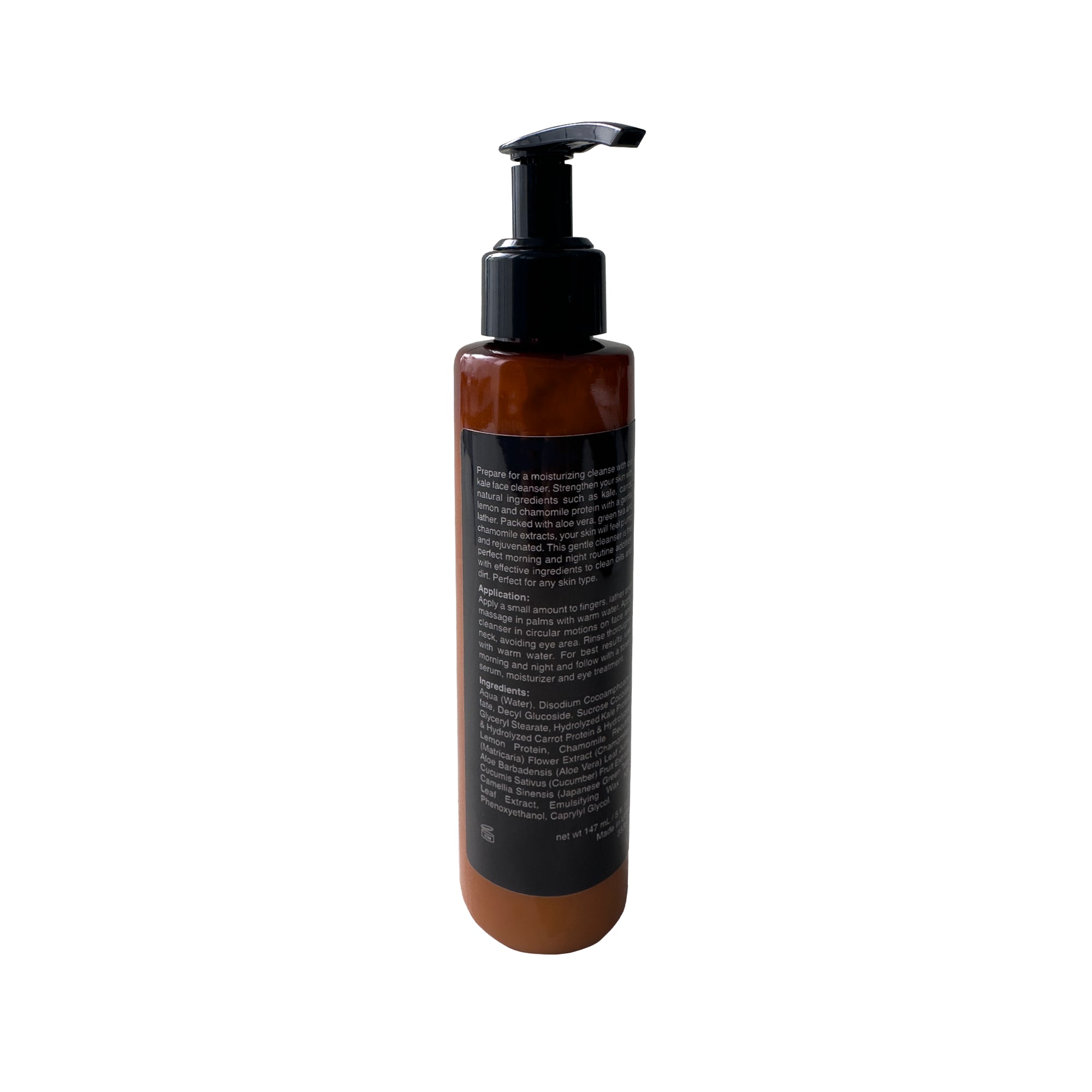 Brown bottle of kale face cleanser with a black pump.