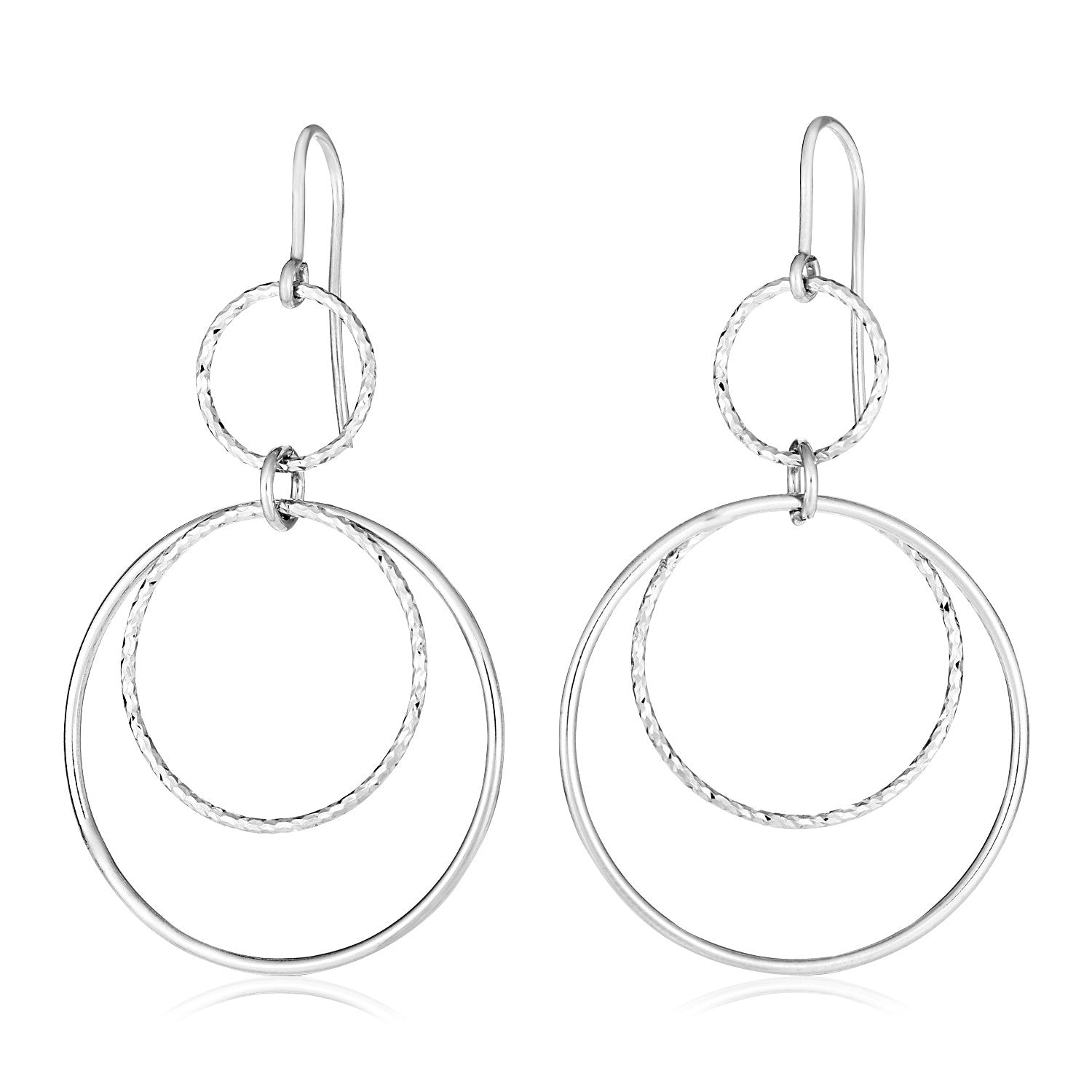Sterling silver dangle earrings with three circles, two polished and one textured.