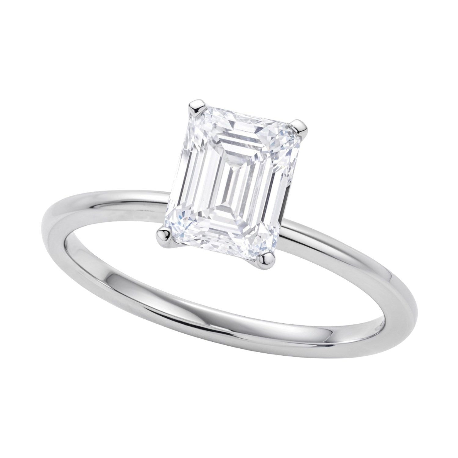 A 14K white gold solitaire ring with an emerald-cut lab-grown diamond.