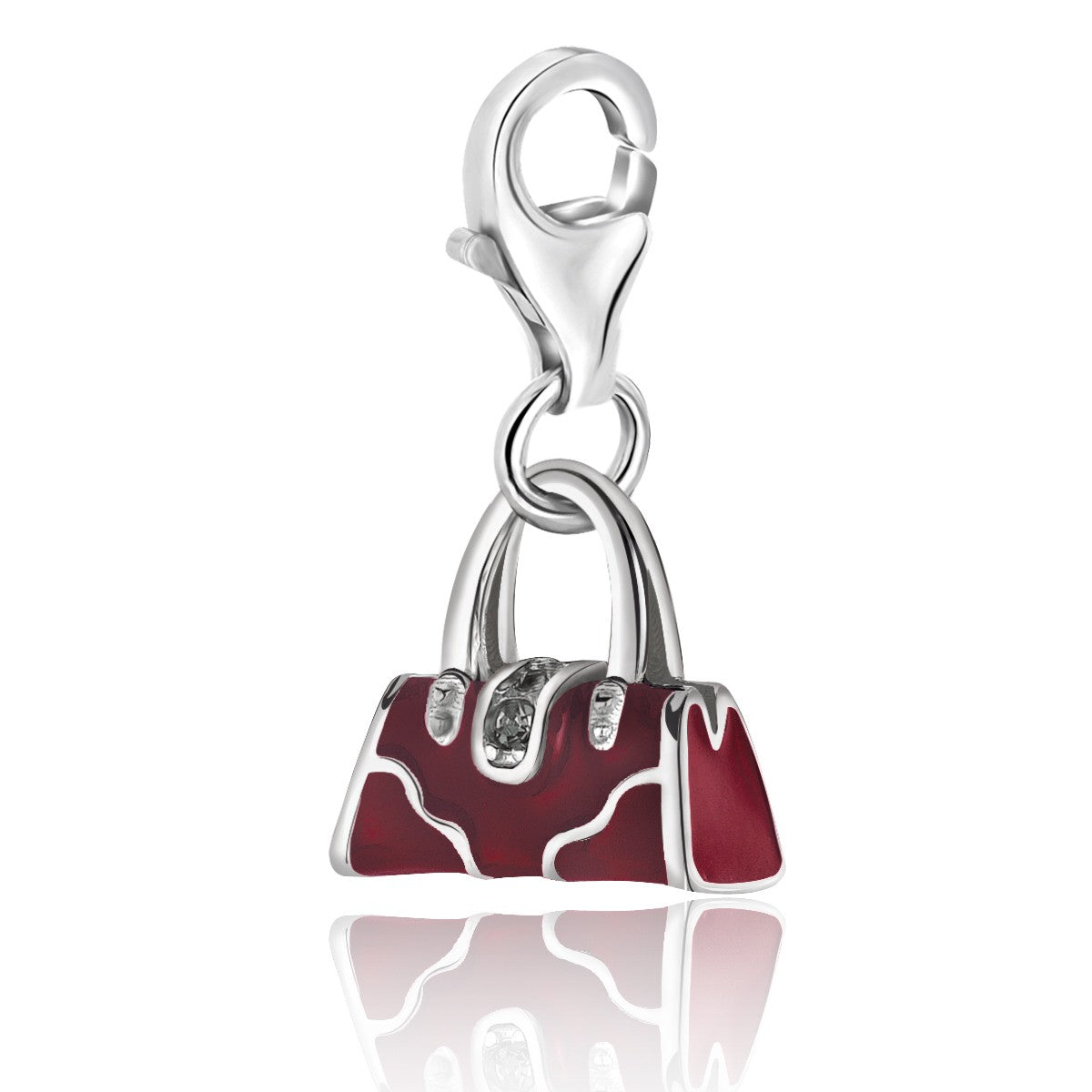 Sterling silver handbag charm with red enamel and crystal accents.