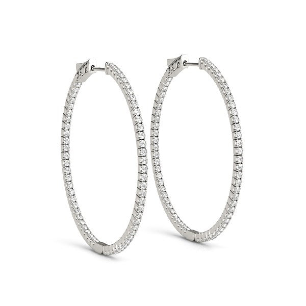 Pair of 14k white gold slim two-sided diamond hoop earrings.