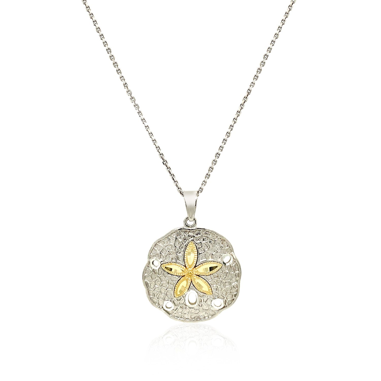 Sterling silver and 14k yellow gold sand dollar pendant on an 18-inch cable chain.