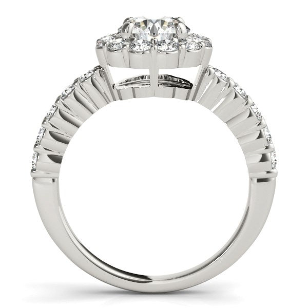 14k white gold engagement ring with a round floral diamond center and diamond-lined shank.
