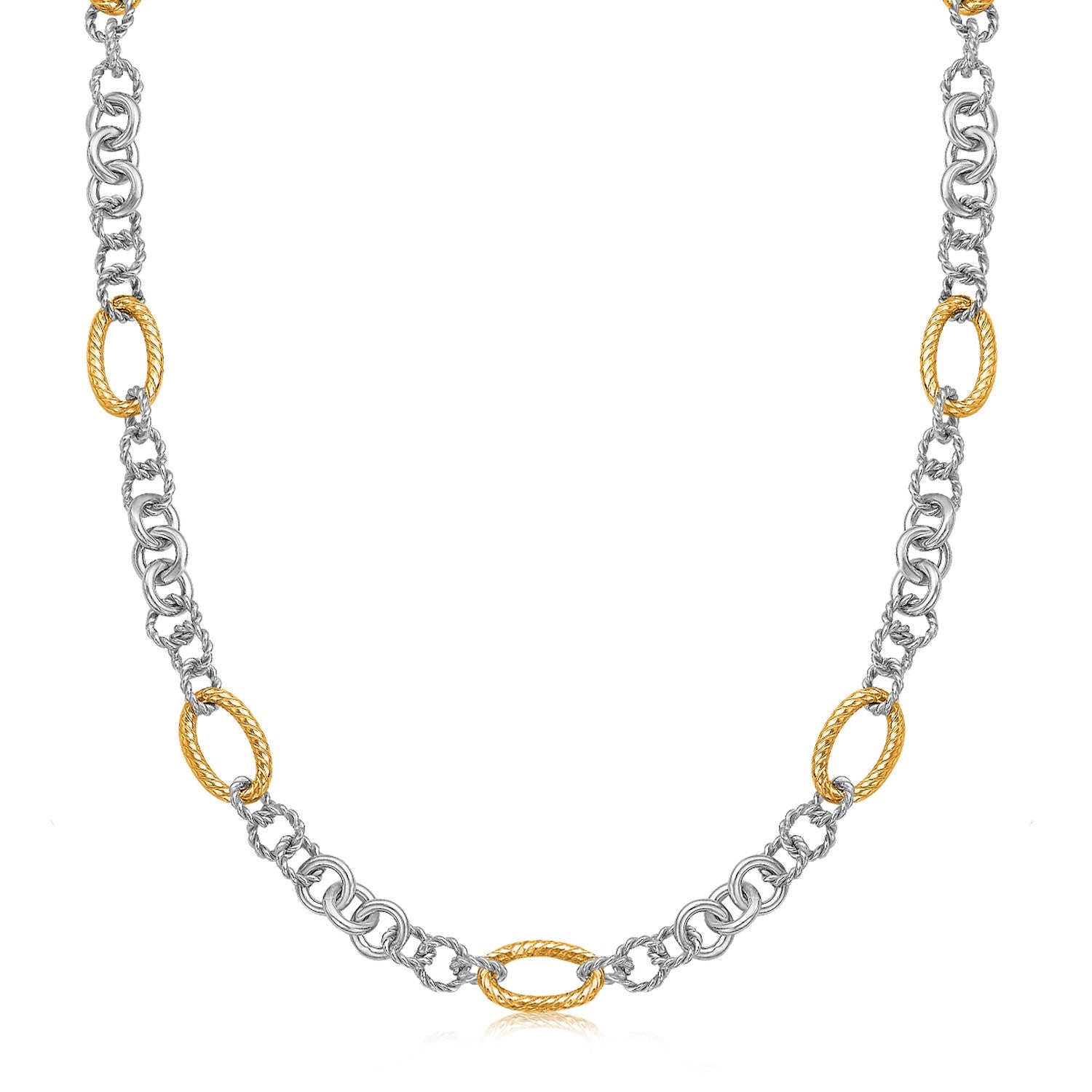 Two-tone sterling silver and 18k yellow gold multi-style chain necklace.