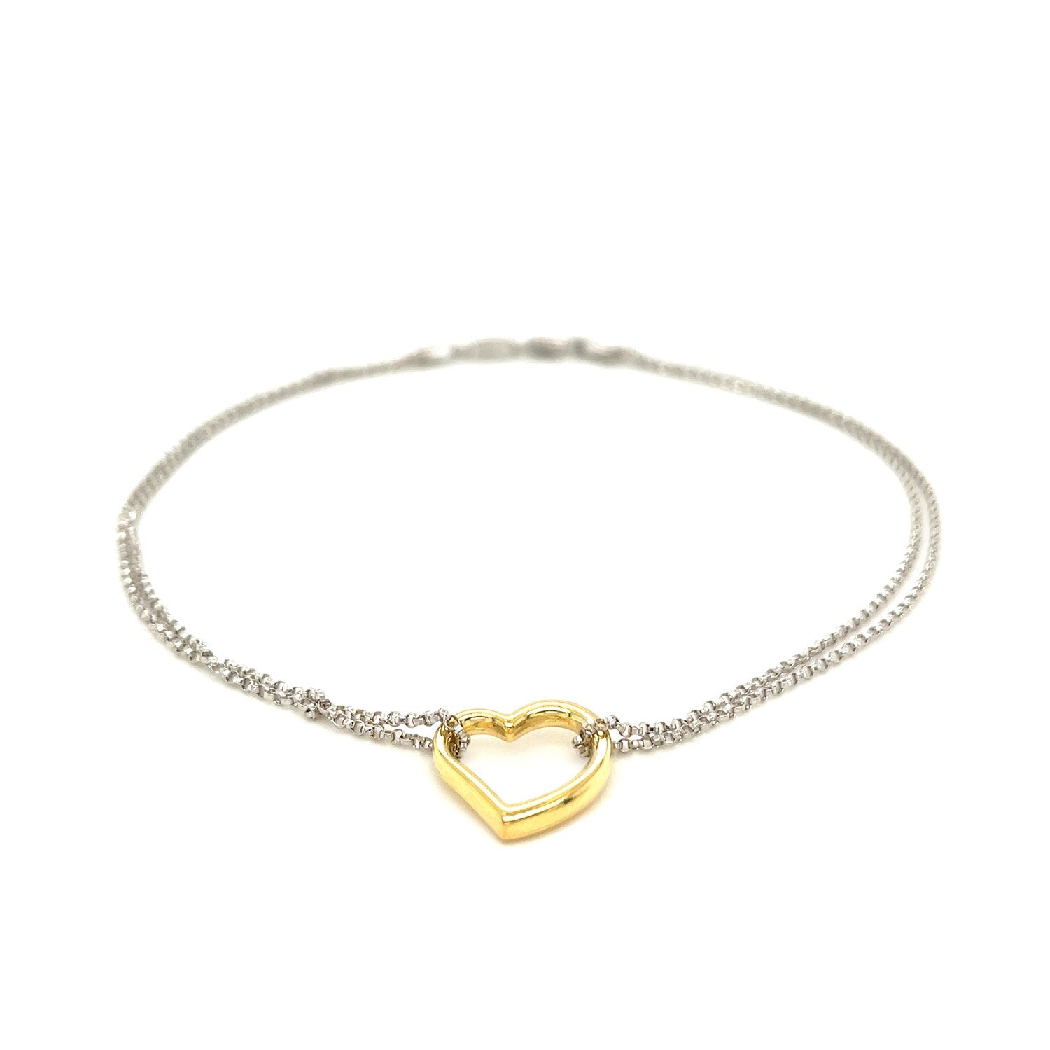 14k yellow gold and sterling silver anklet with a single open heart station.