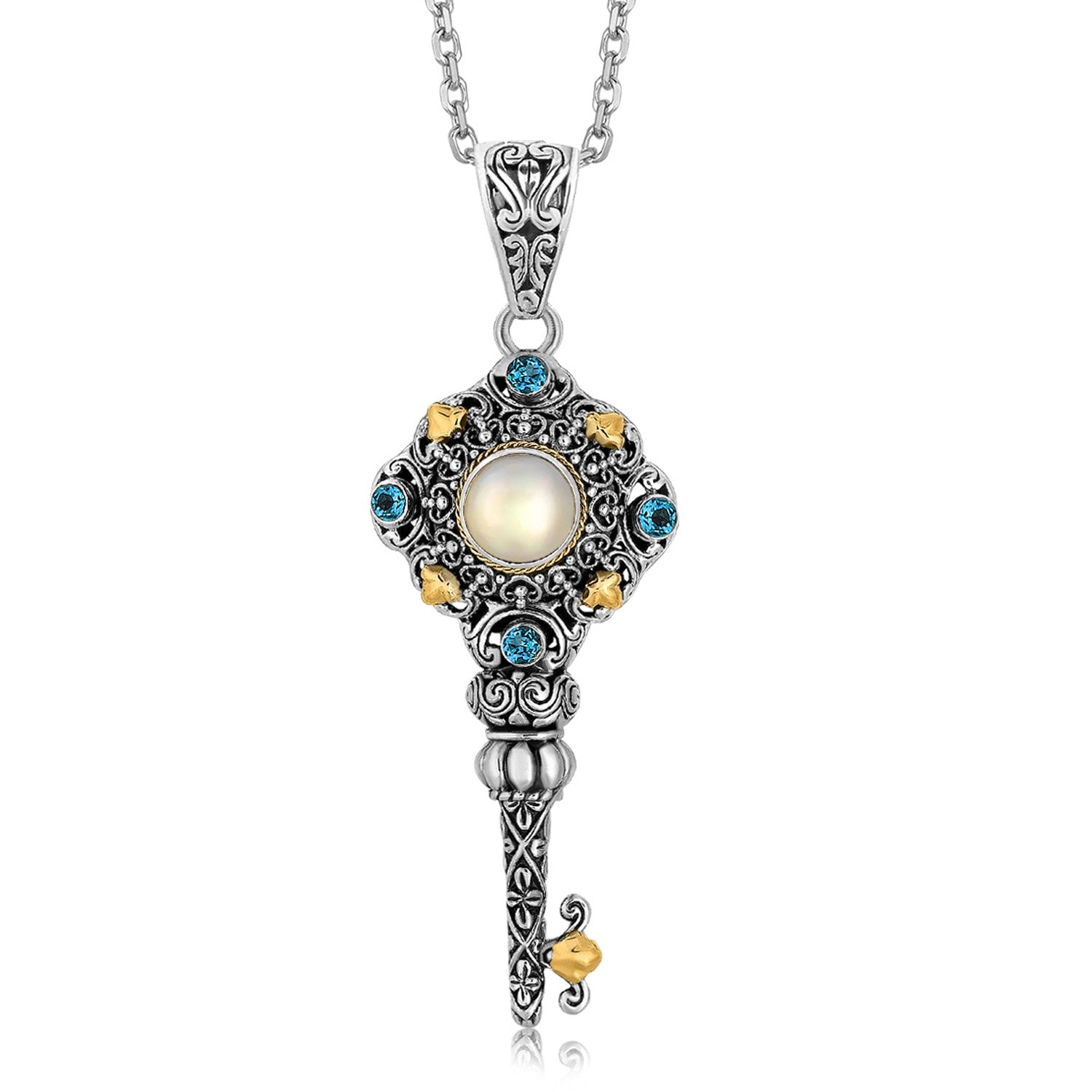 Sterling silver and 18K yellow gold key pendant with a pearl and blue topaz stones.