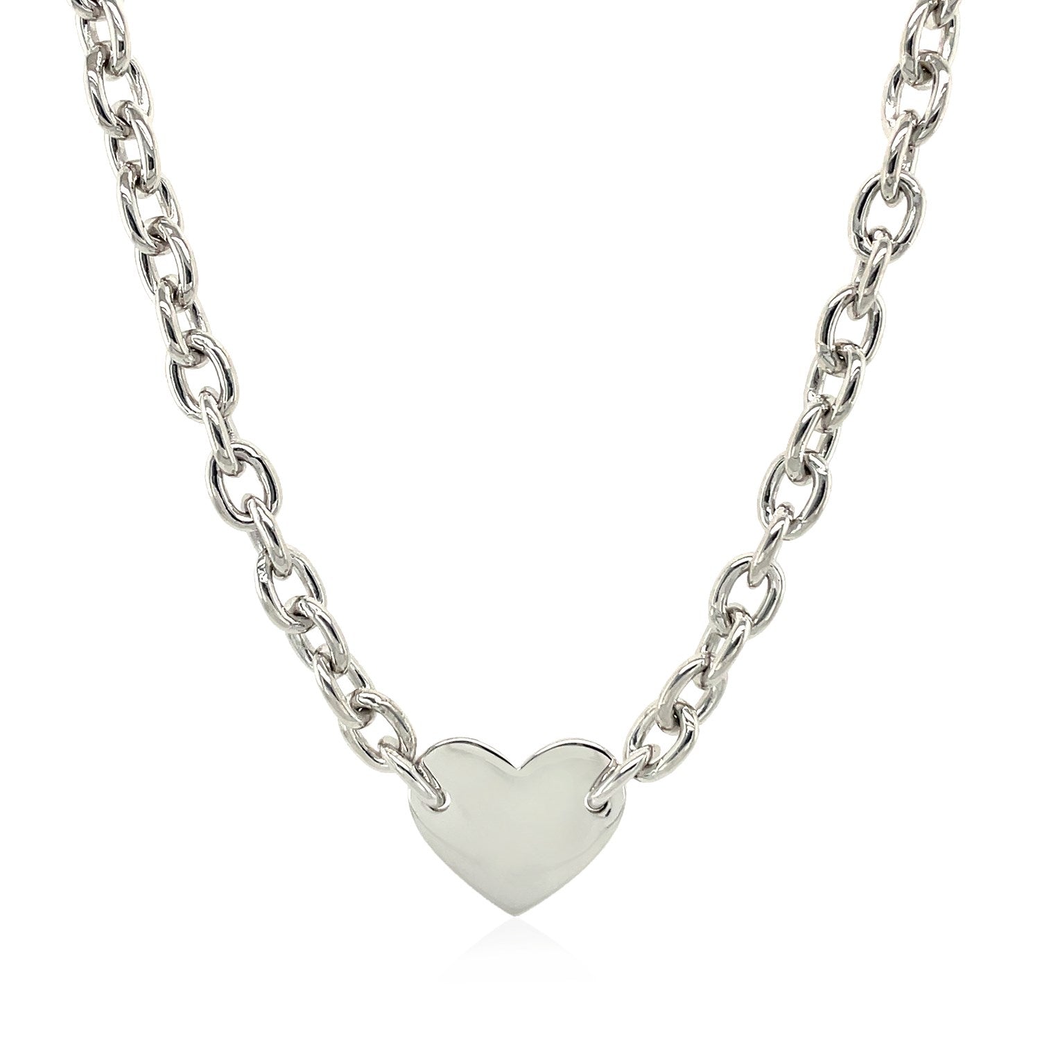 Sterling silver rhodium plated chain necklace with a flat heart motif station.