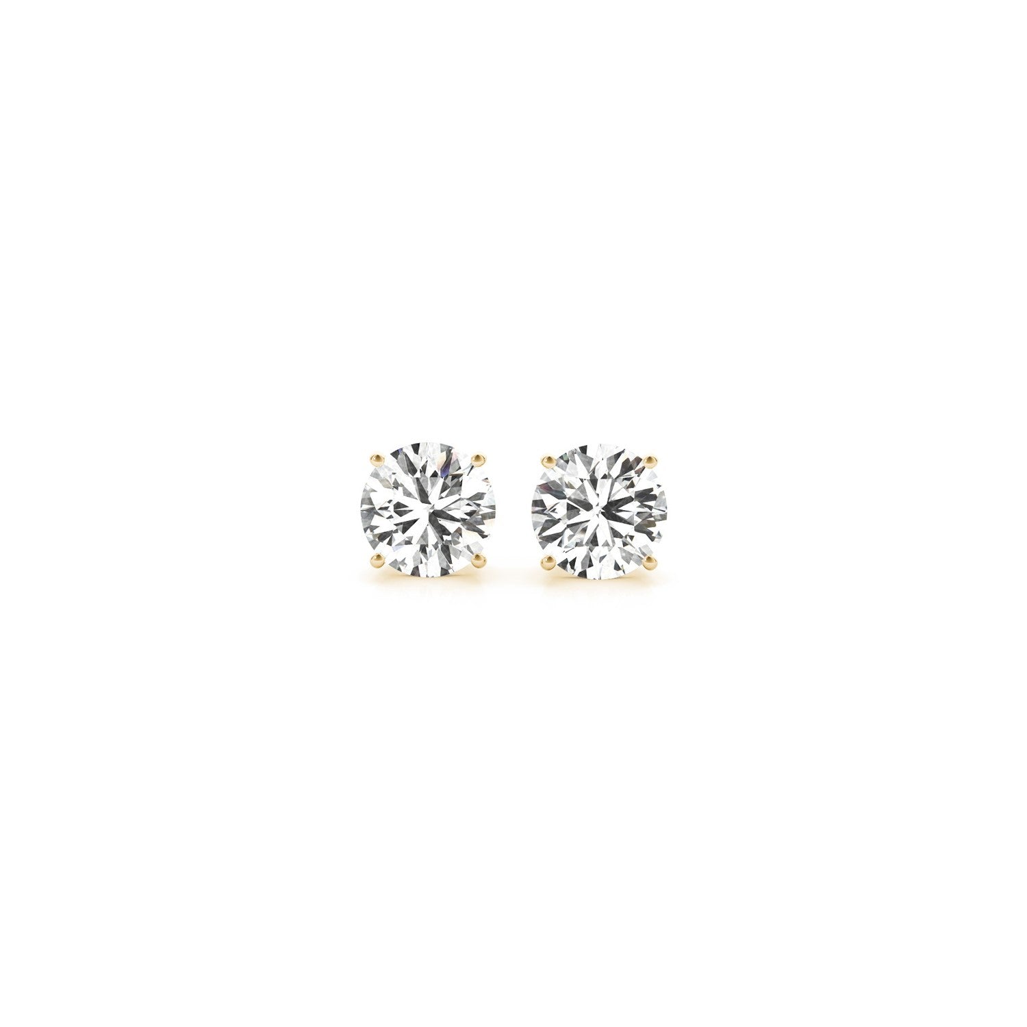 A pair of round brilliant cut diamond stud earrings in yellow gold four-prong settings.