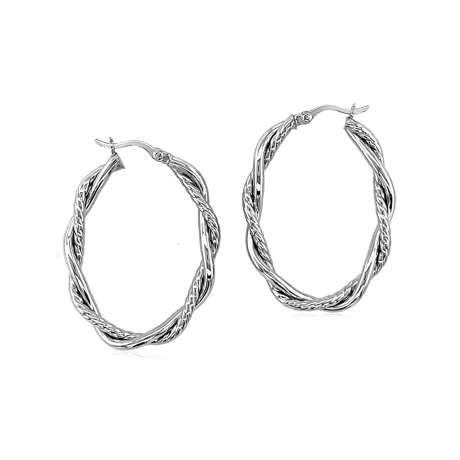 A pair of sterling silver oval hoop braided diamond cut earrings.