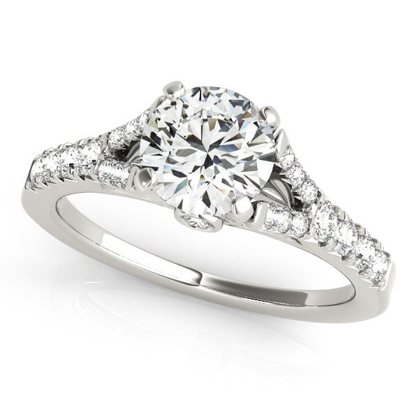 14k white gold engagement ring with a round diamond center and split shank.