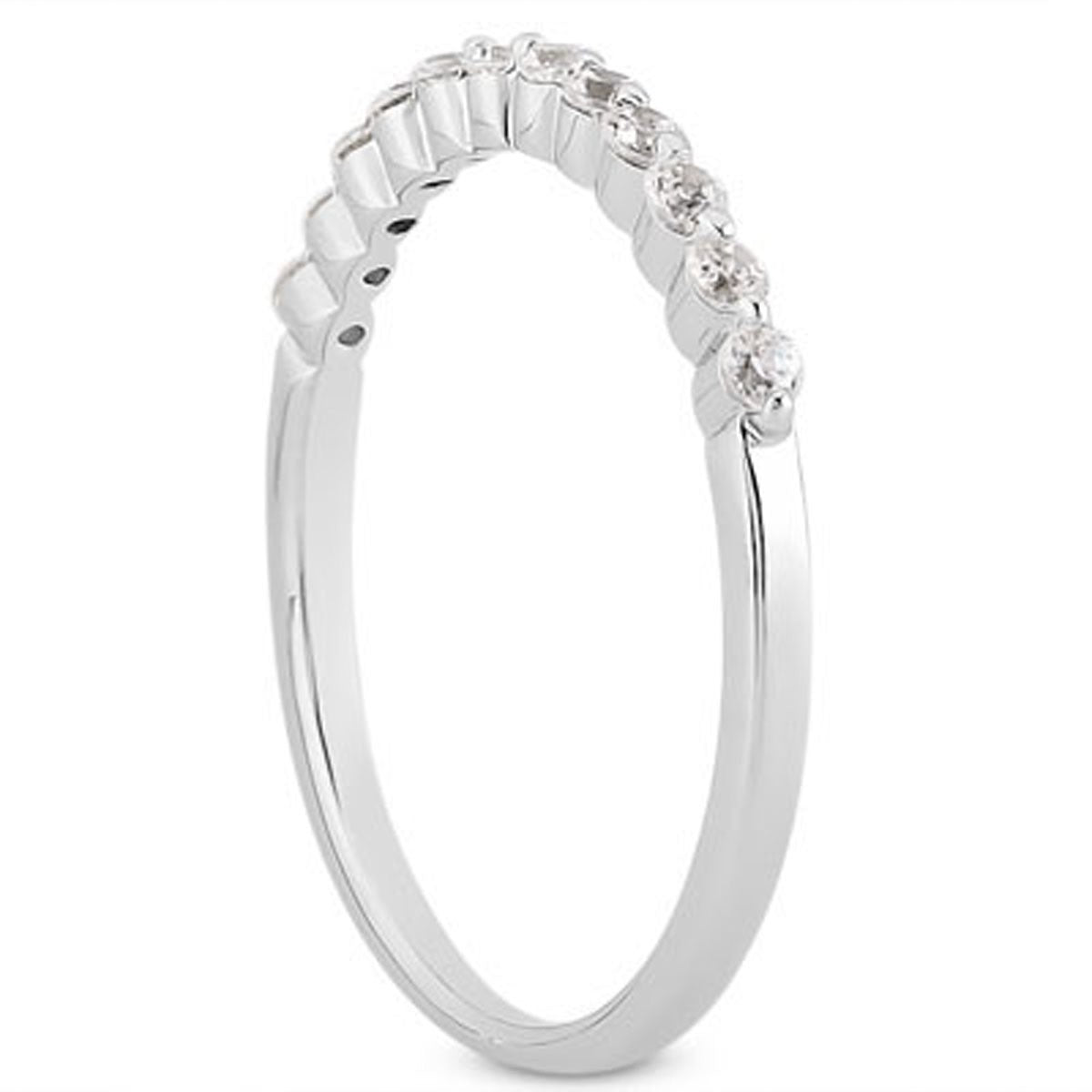 14k white gold wedding band with twelve round diamonds in a shared prong setting.