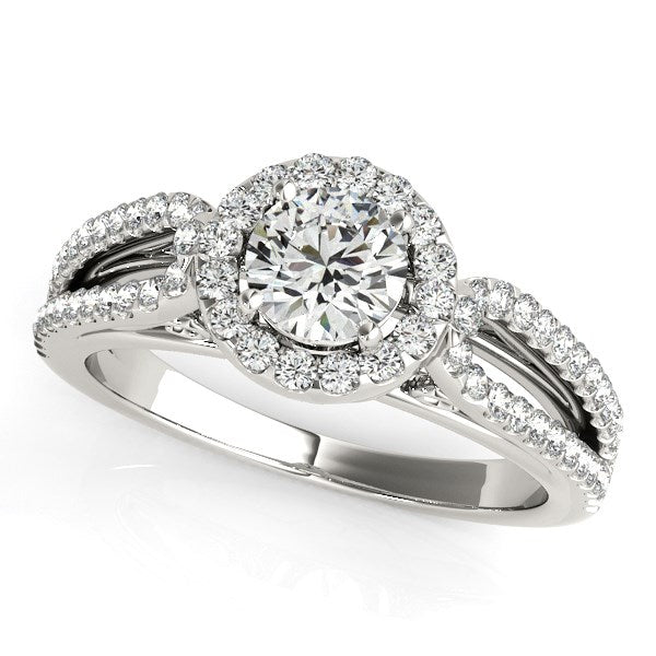 14k white gold diamond engagement ring with a round halo and split shank.