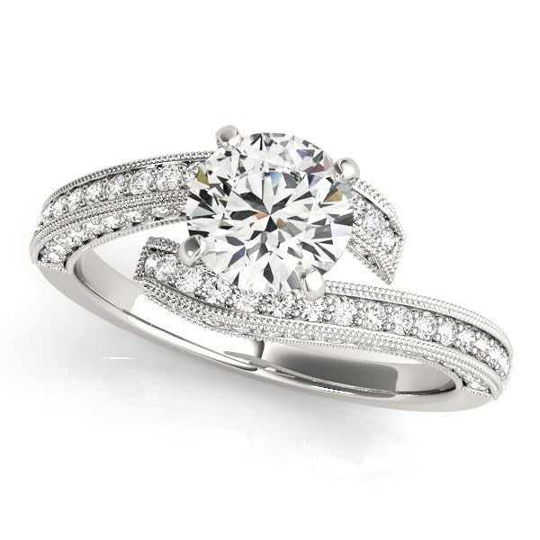 14k white gold round diamond bypass engagement ring with pave and milgrain detailing.