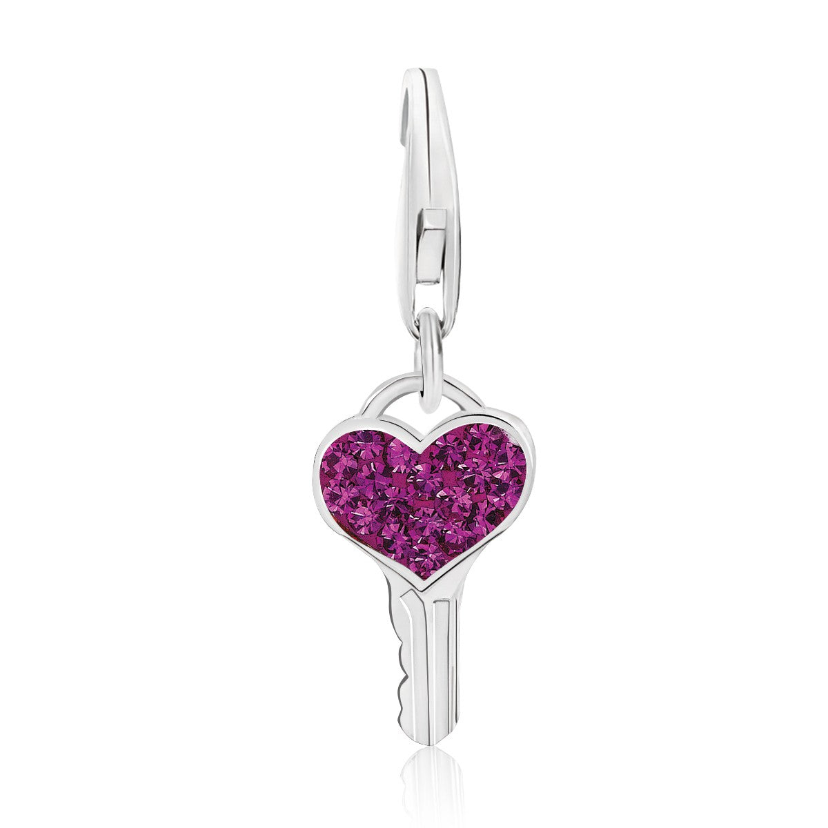 Sterling silver key charm with a heart-shaped top filled with magenta crystals.
