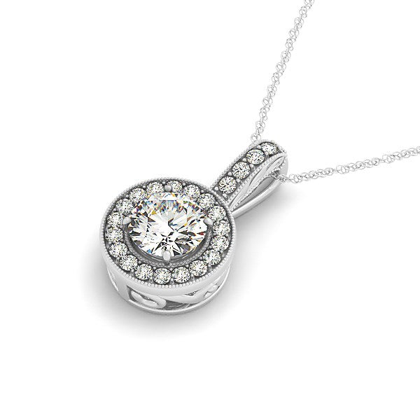 A white gold diamond halo pendant with a milgrain edge on a delicate chain.