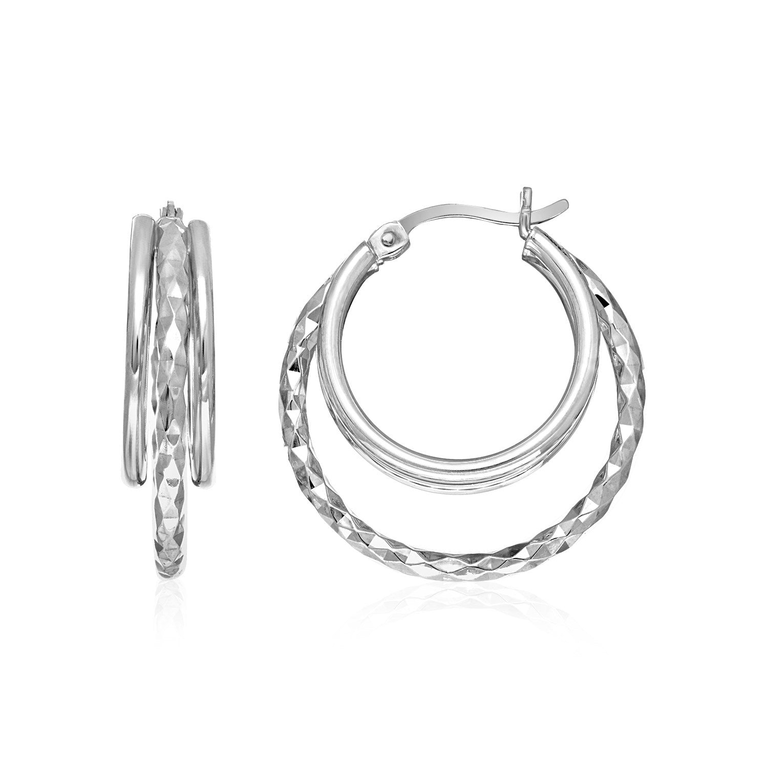 Sterling silver two-part graduated polished and textured hoop earrings with hinge clasps.