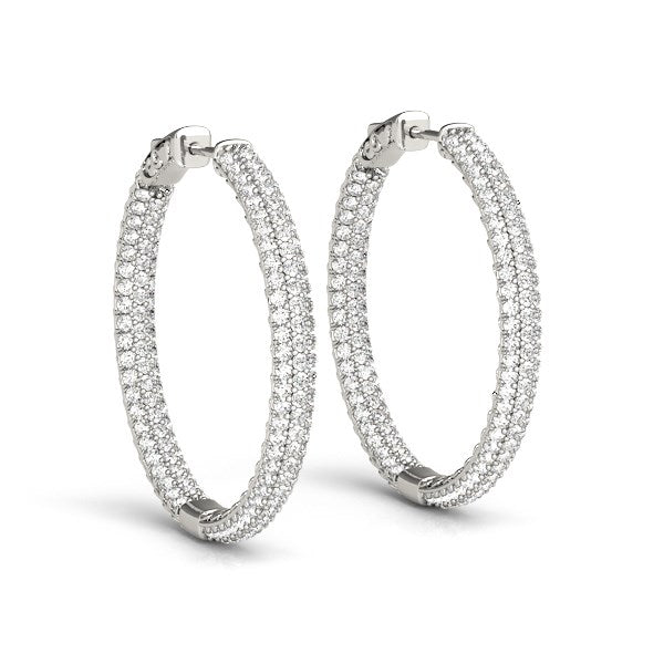 14k white gold two-row pave set diamond hoop earrings with hinge locks.