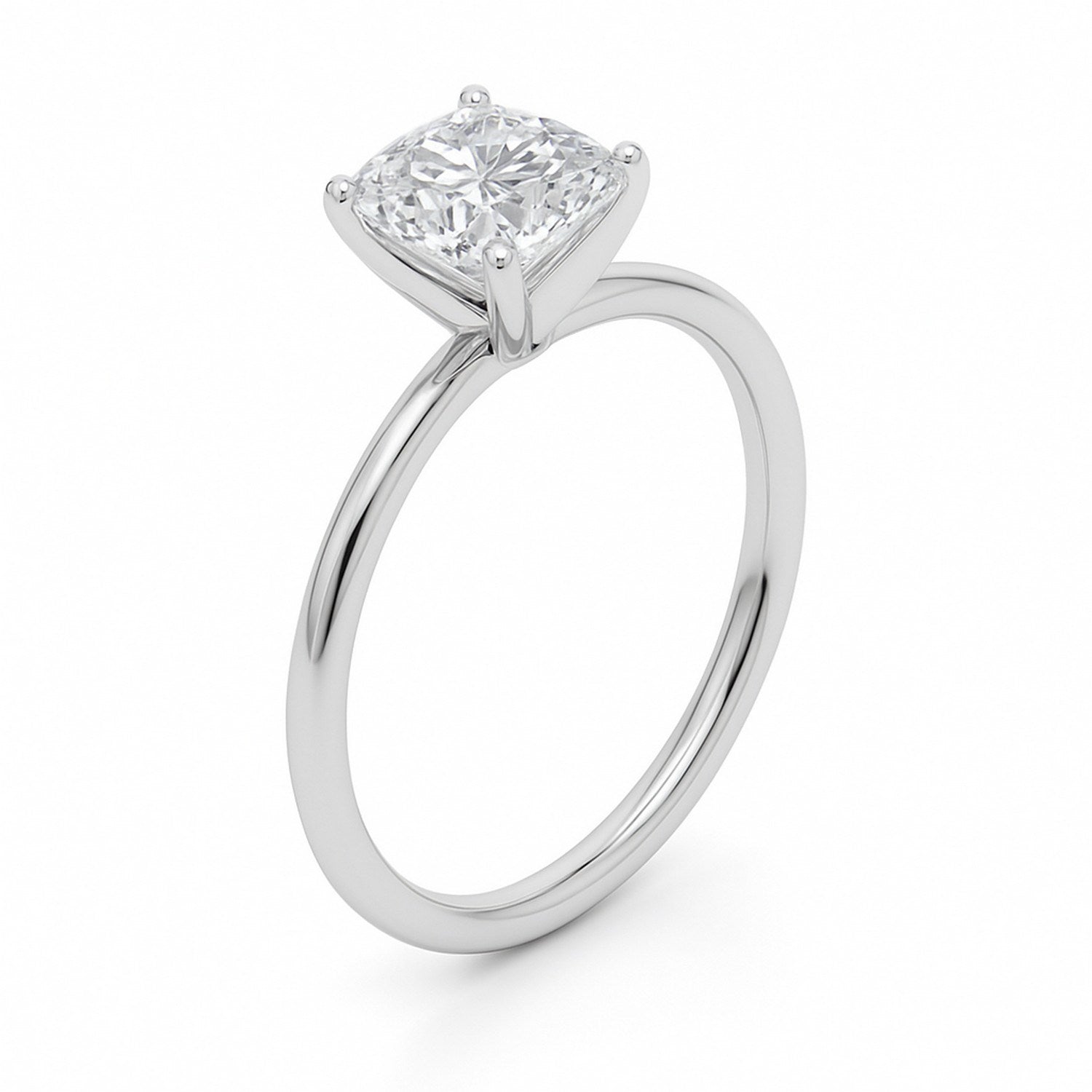 A 14K white gold solitaire ring with a cushion-cut lab-grown diamond in a four-prong setting.