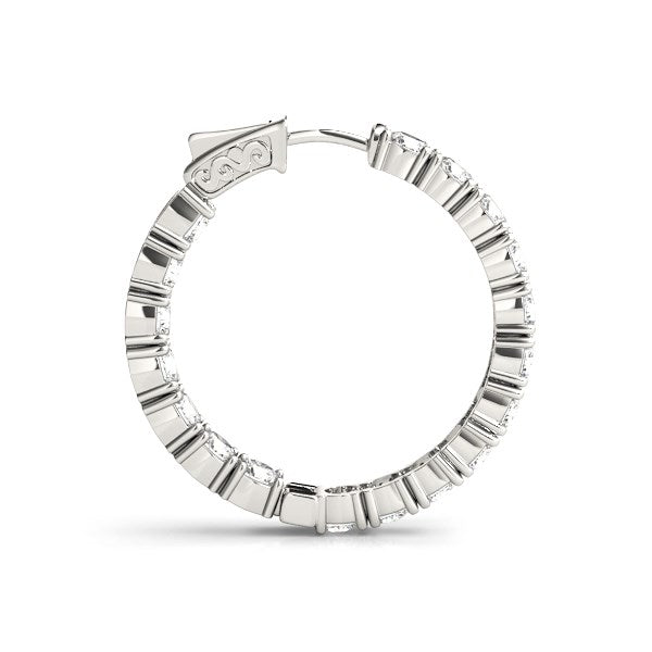 14k white gold two-sided hoop earring with prong-set round diamonds and a hinge lock.