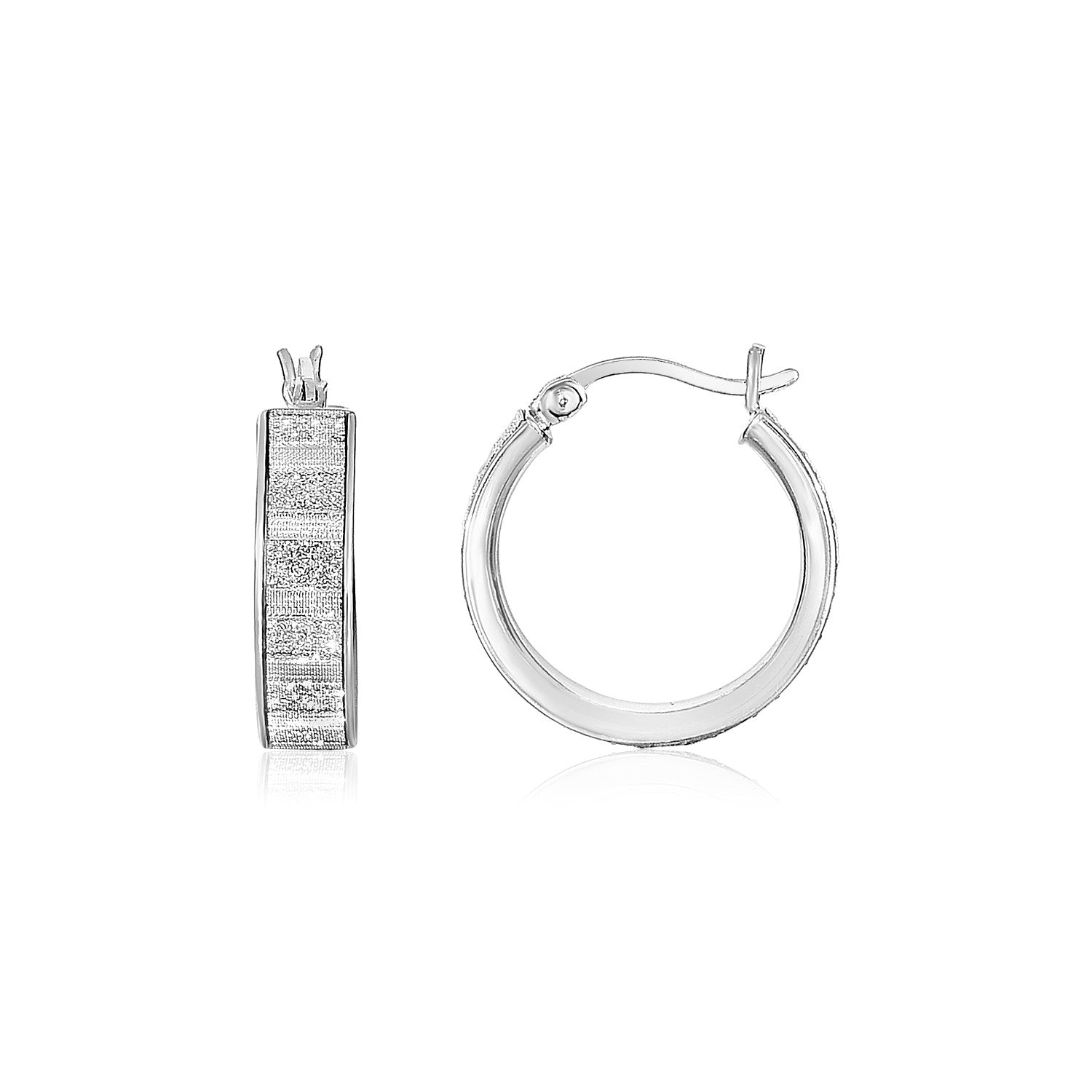 Sterling silver petite glitter texture round hoop earrings with hinged clasps.