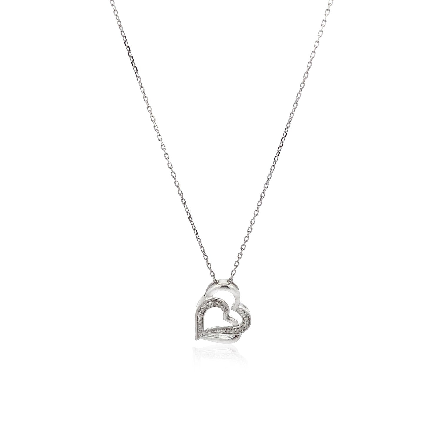 Sterling silver dual heart pendant with diamonds on an 18-inch cable chain.