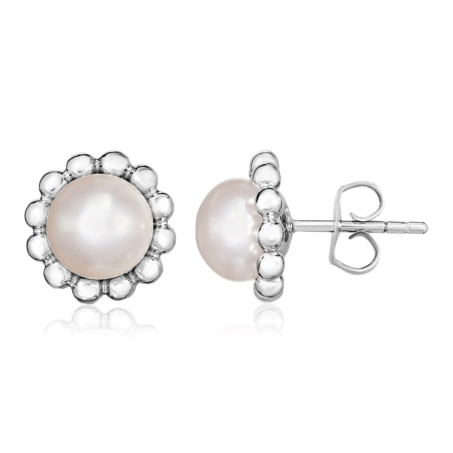 Sterling silver flower motif earrings with round pearls and pushback clasps.