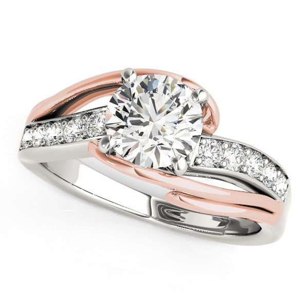 14k white and rose gold bypass shank diamond engagement ring with a round center stone.