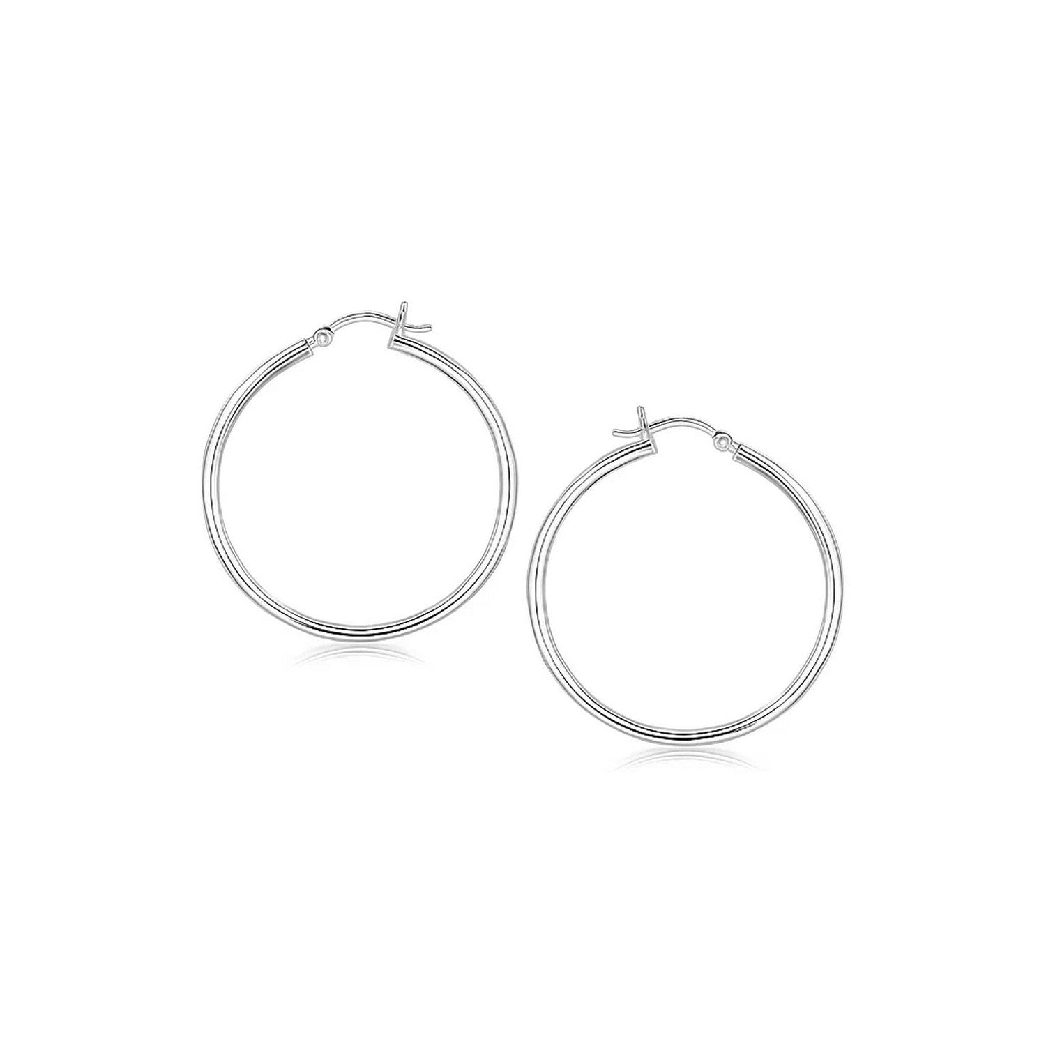 Two polished sterling silver rhodium-plated thin hoop earrings with snapbacks.