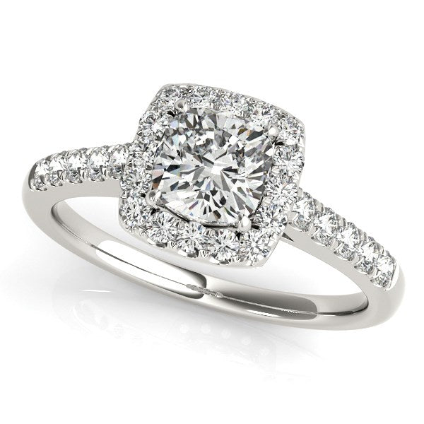 14k white gold engagement ring with a round diamond in a square halo and pave band.