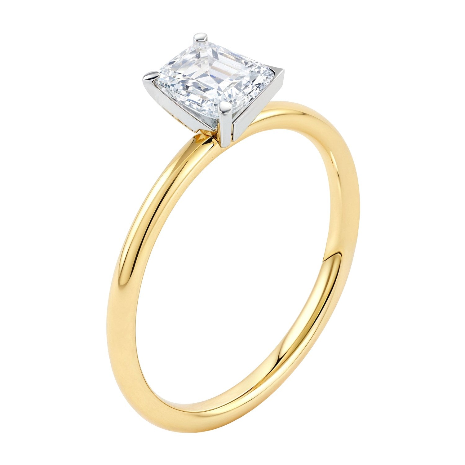 A 1 carat emerald lab grown diamond solitaire ring in 14K yellow gold.