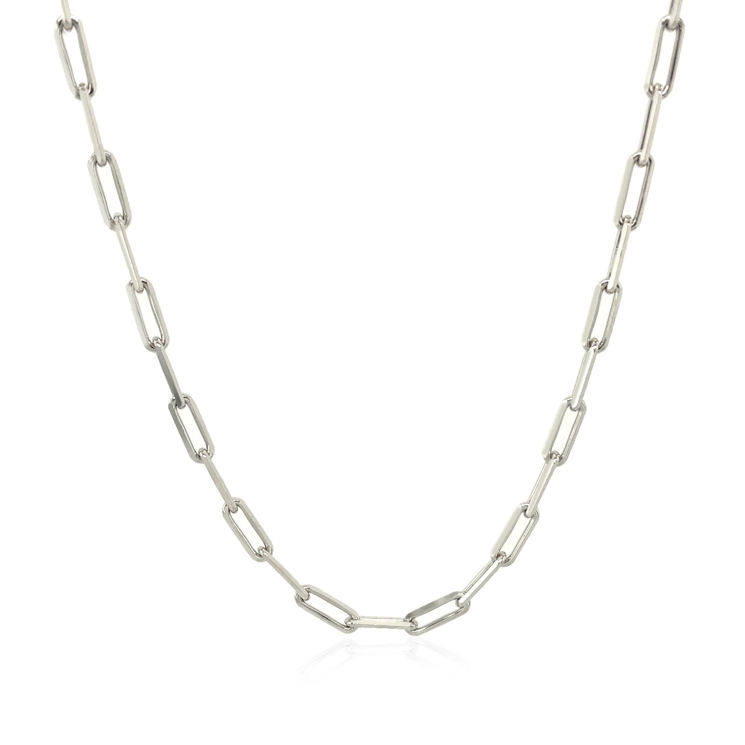 A rhodium-plated sterling silver paperclip chain is draped against a white background.