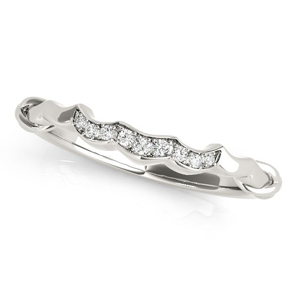 14k white gold scallop wedding band with nine prong-set round diamonds.
