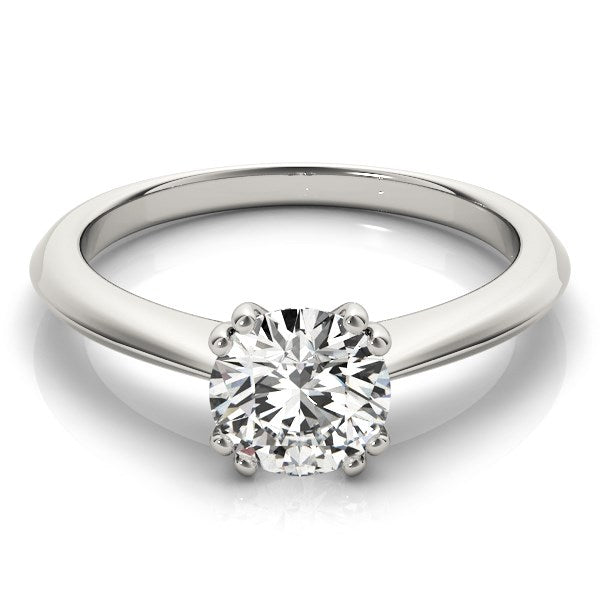 14k white gold engagement ring with a round, double prong set solitaire diamond.