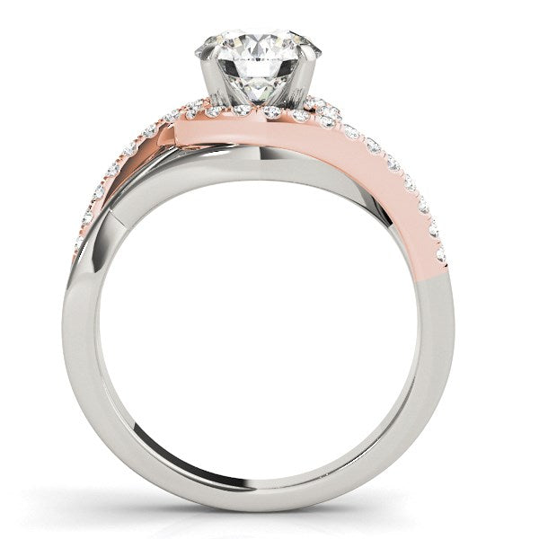 14k white and rose gold bypass diamond engagement ring with a round center stone.