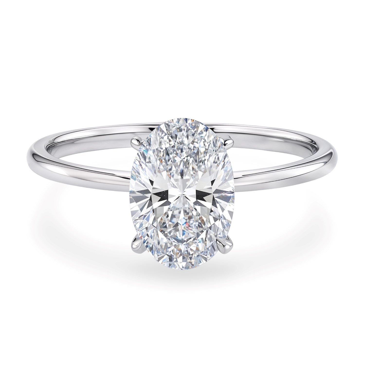 Oval lab-grown diamond solitaire ring in 14K white gold with a four-prong setting.