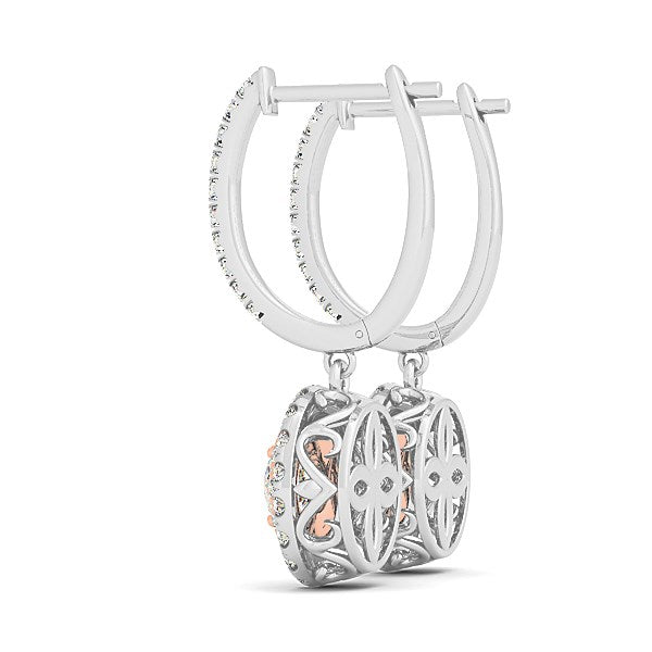 14k white and rose gold drop diamond earrings with a halo design and filigree detailing.