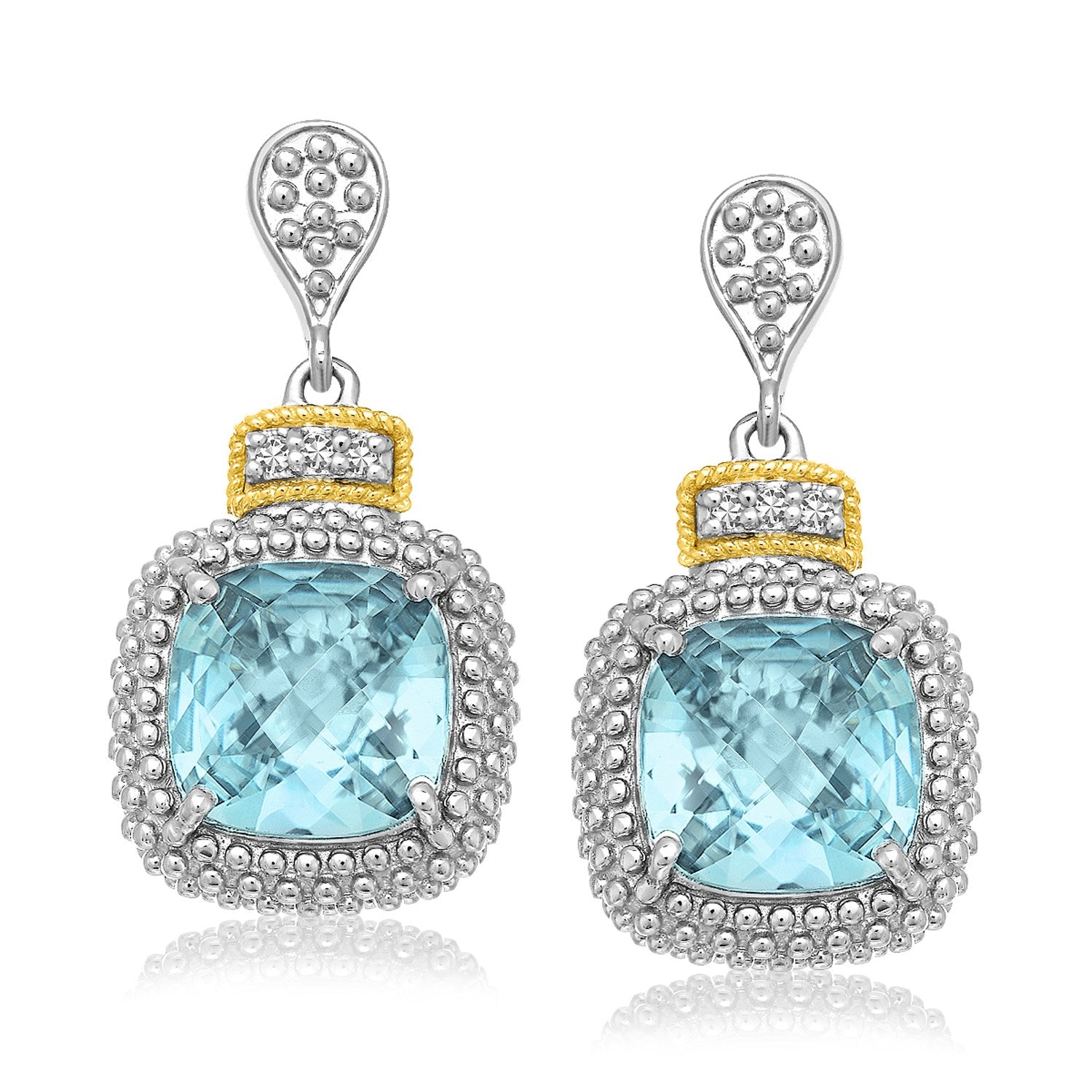 Sterling silver and yellow gold earrings with cushion-cut blue topaz and diamond accents.