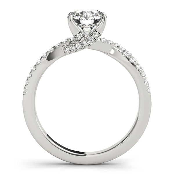 14k white gold engagement ring with a round diamond and pave split shank.
