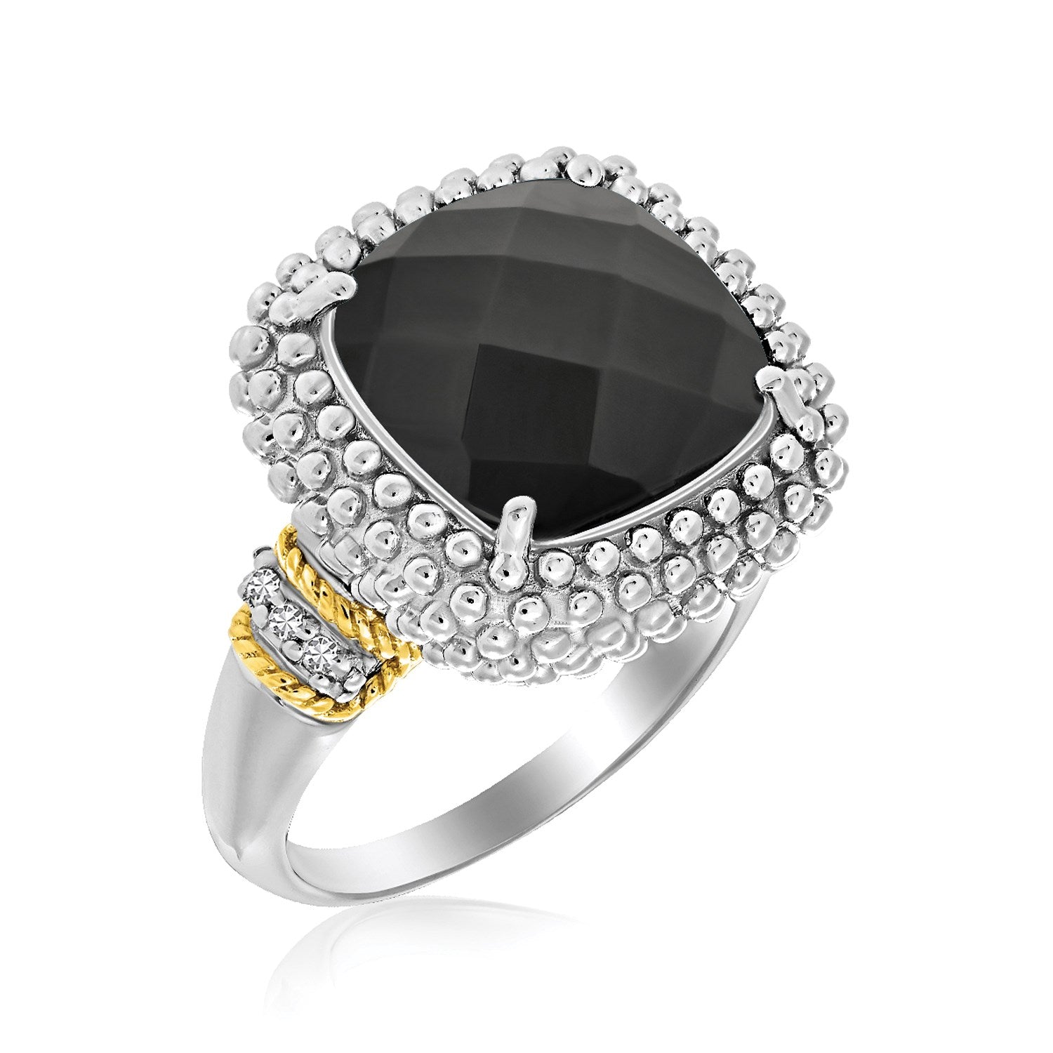 Sterling silver and 18k yellow gold ring with a black onyx cushion and diamond accents.