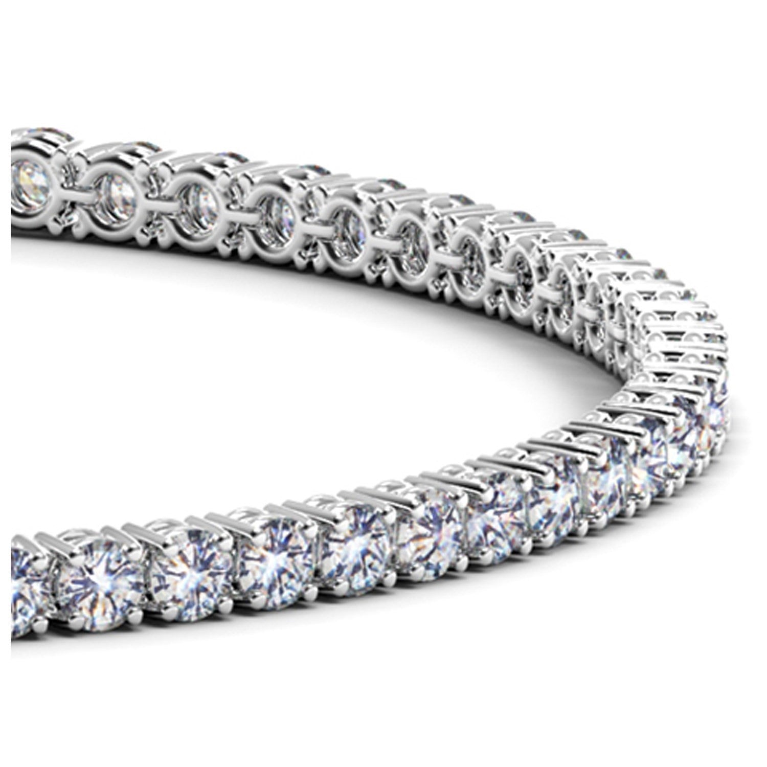 A white gold tennis bracelet with numerous round, brilliant-cut diamonds.