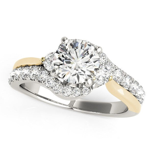 A two-tone gold engagement ring with a round center diamond and pave-set side diamonds.
