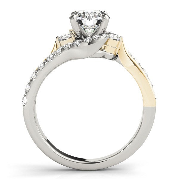 A two-tone gold engagement ring with a round diamond center stone and pavé accents.