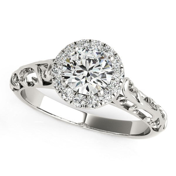 14k white gold halo antique style engagement ring with a round diamond center.