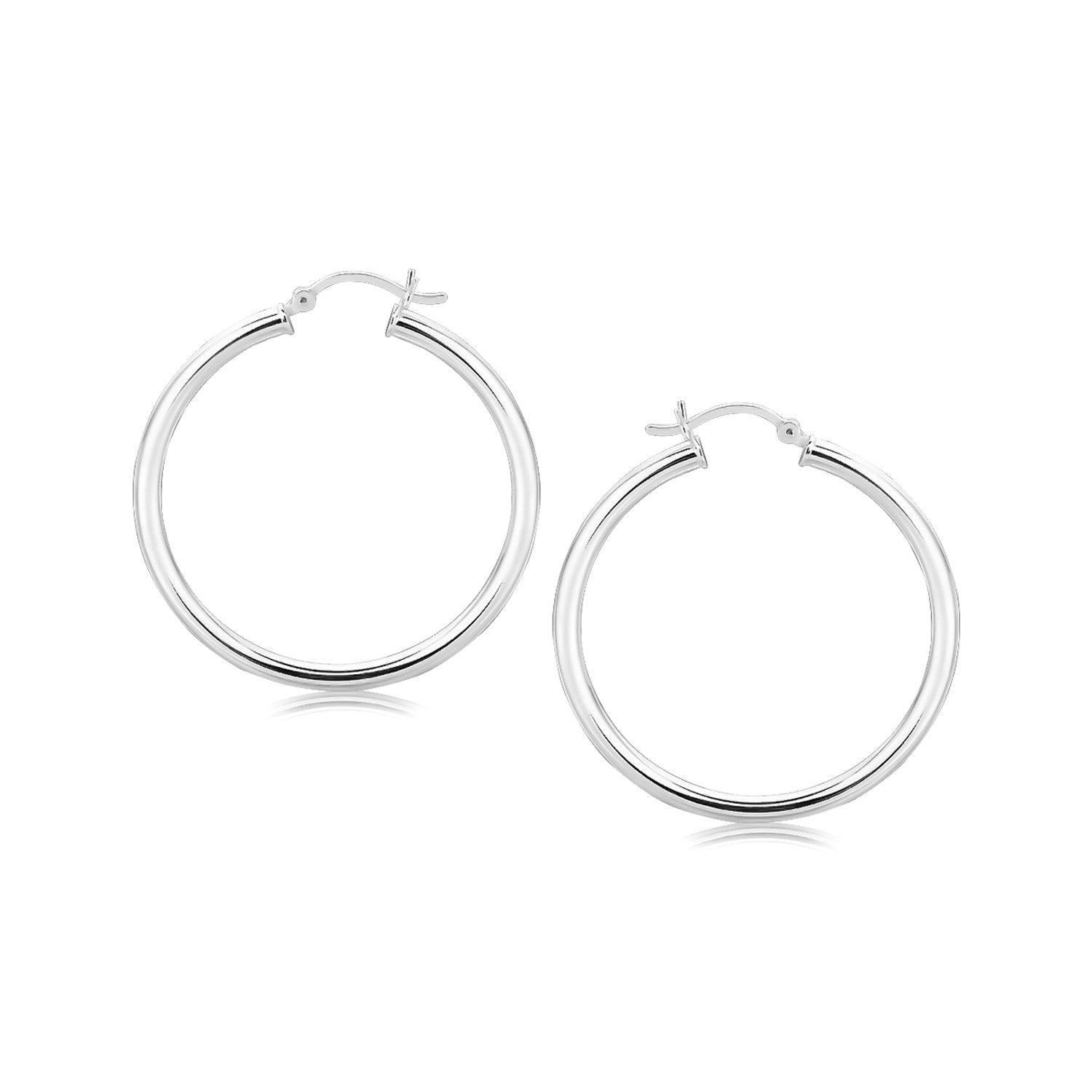 Sterling silver rhodium plated polished hoop earrings with snapbacks.