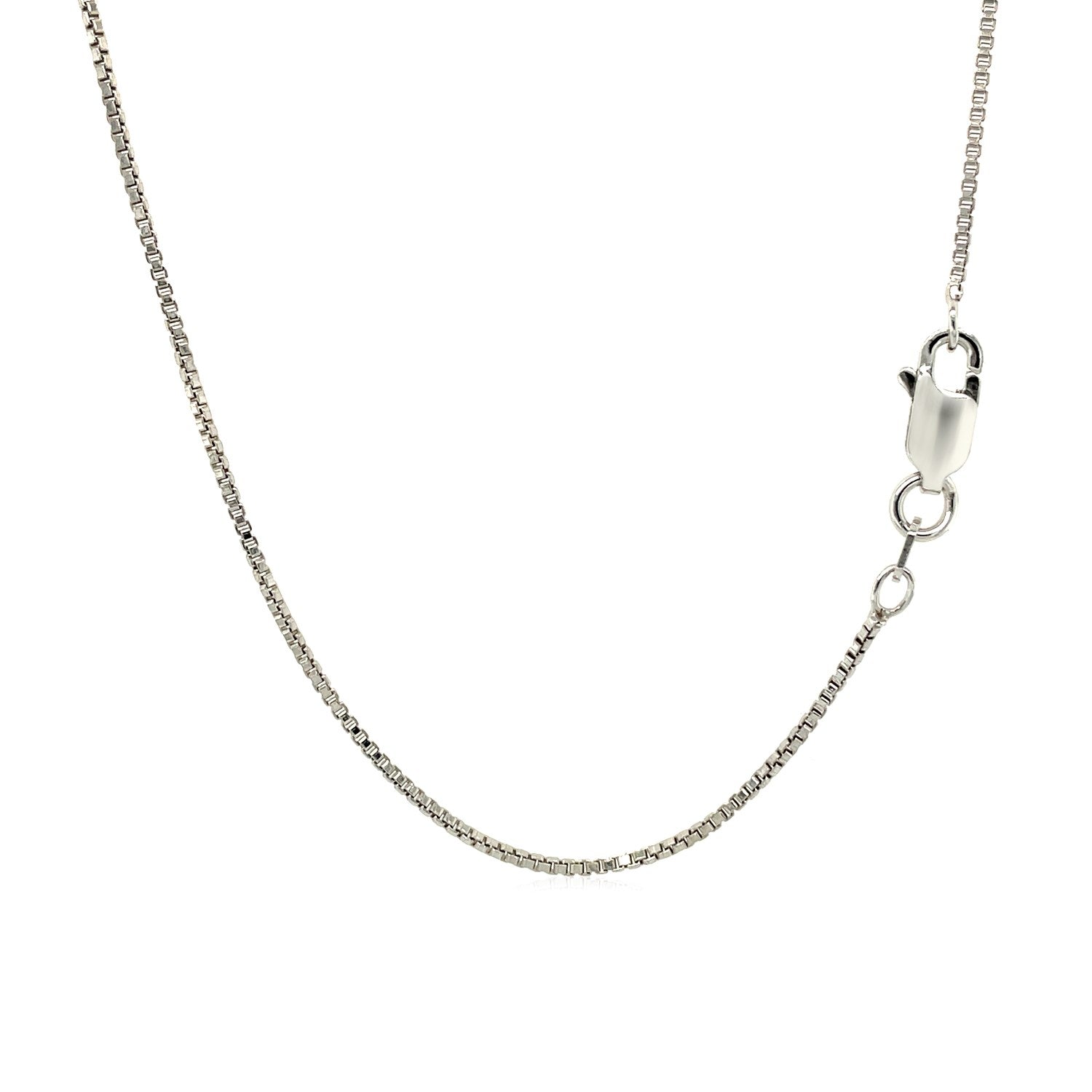 Sterling silver box chain with a lobster clasp on a white background.