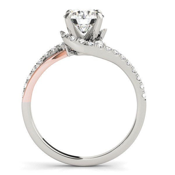 14k white and rose gold bypass shank diamond engagement ring with a round center stone.