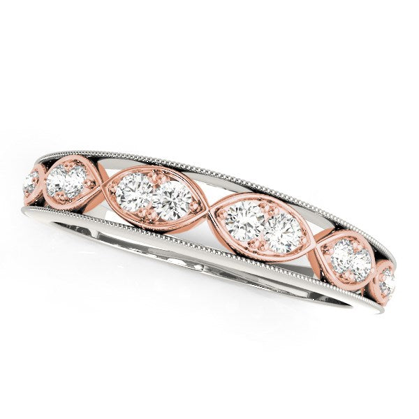 14k white and rose gold infinity style diamond band with milgrain edge.