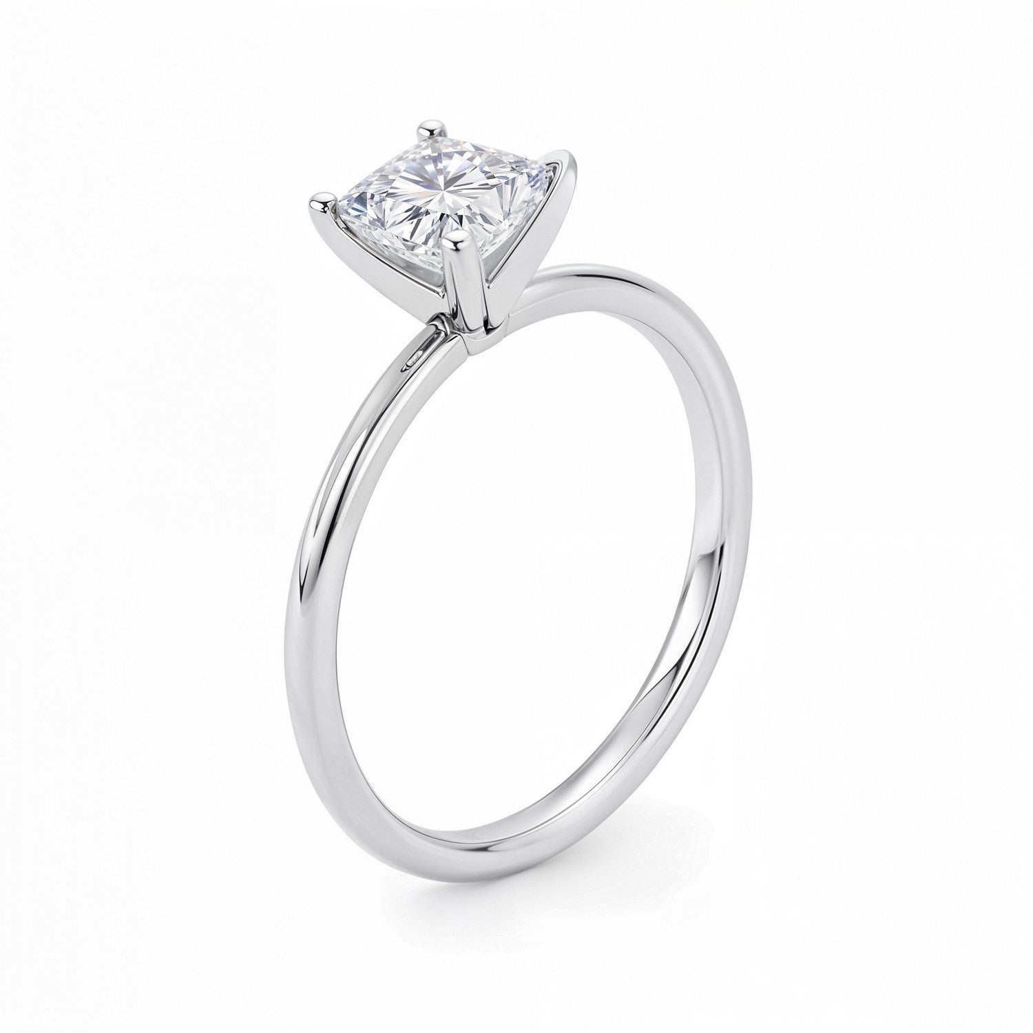A 10K white gold solitaire ring with a princess-cut lab-grown diamond.
